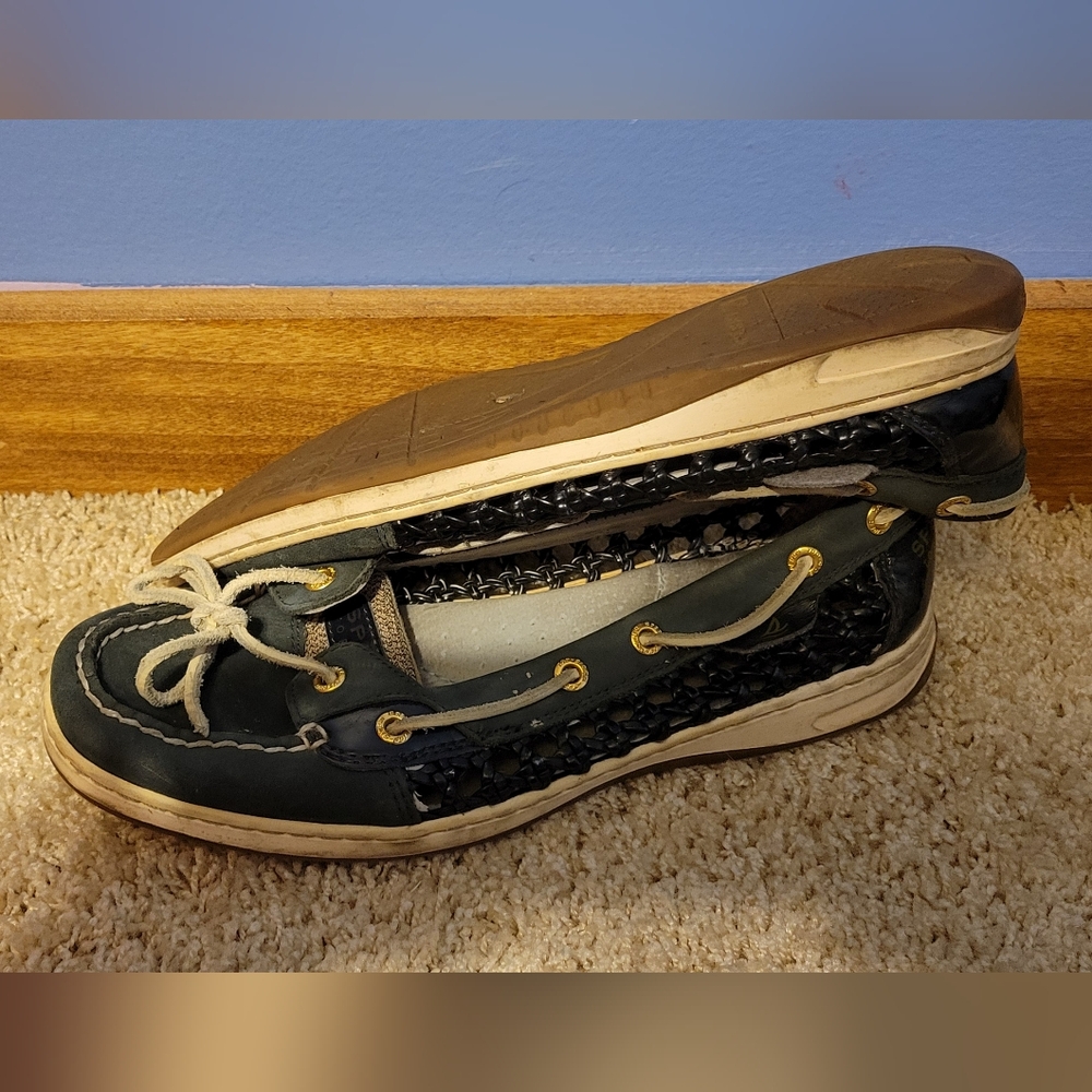Sperry Top Sider.  Well loved. Dog friendly home.